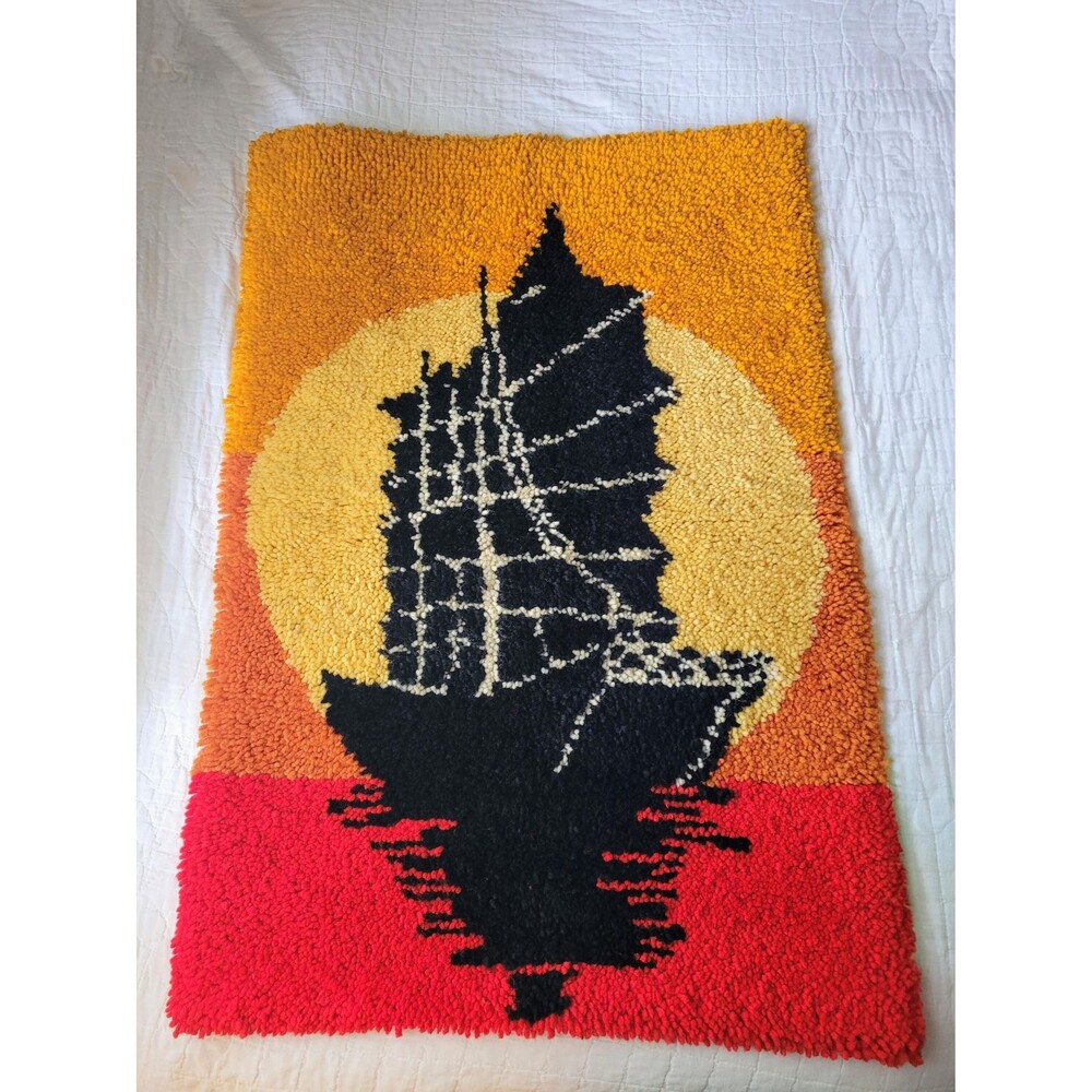 Vintage 1970s handmade latch hook rug sailboat and sunset wall art